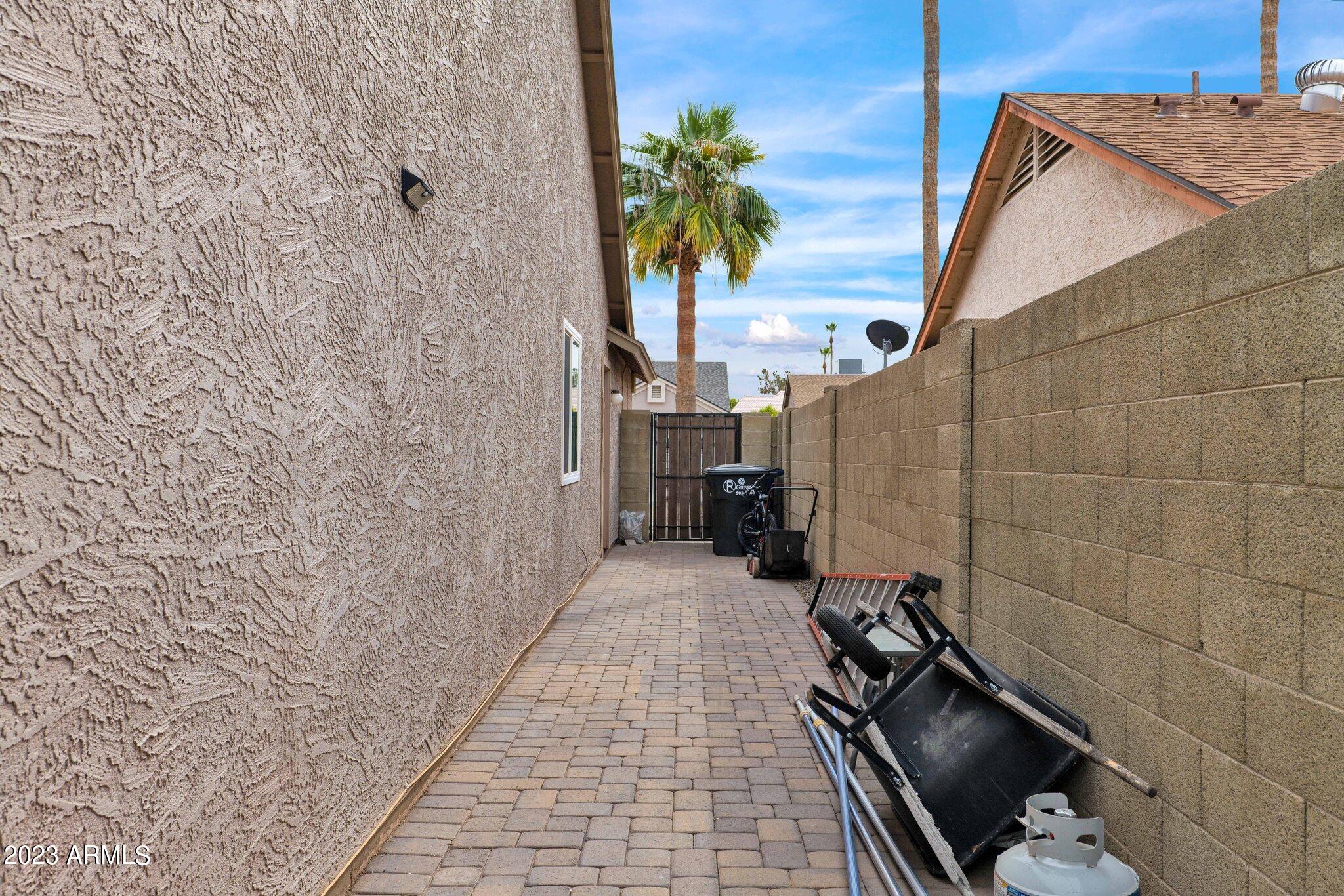 4338 East Douglas Avenue Gilbert, AZ 85234 - Photo 35 of 48 a bathroom with a sink and a mirror