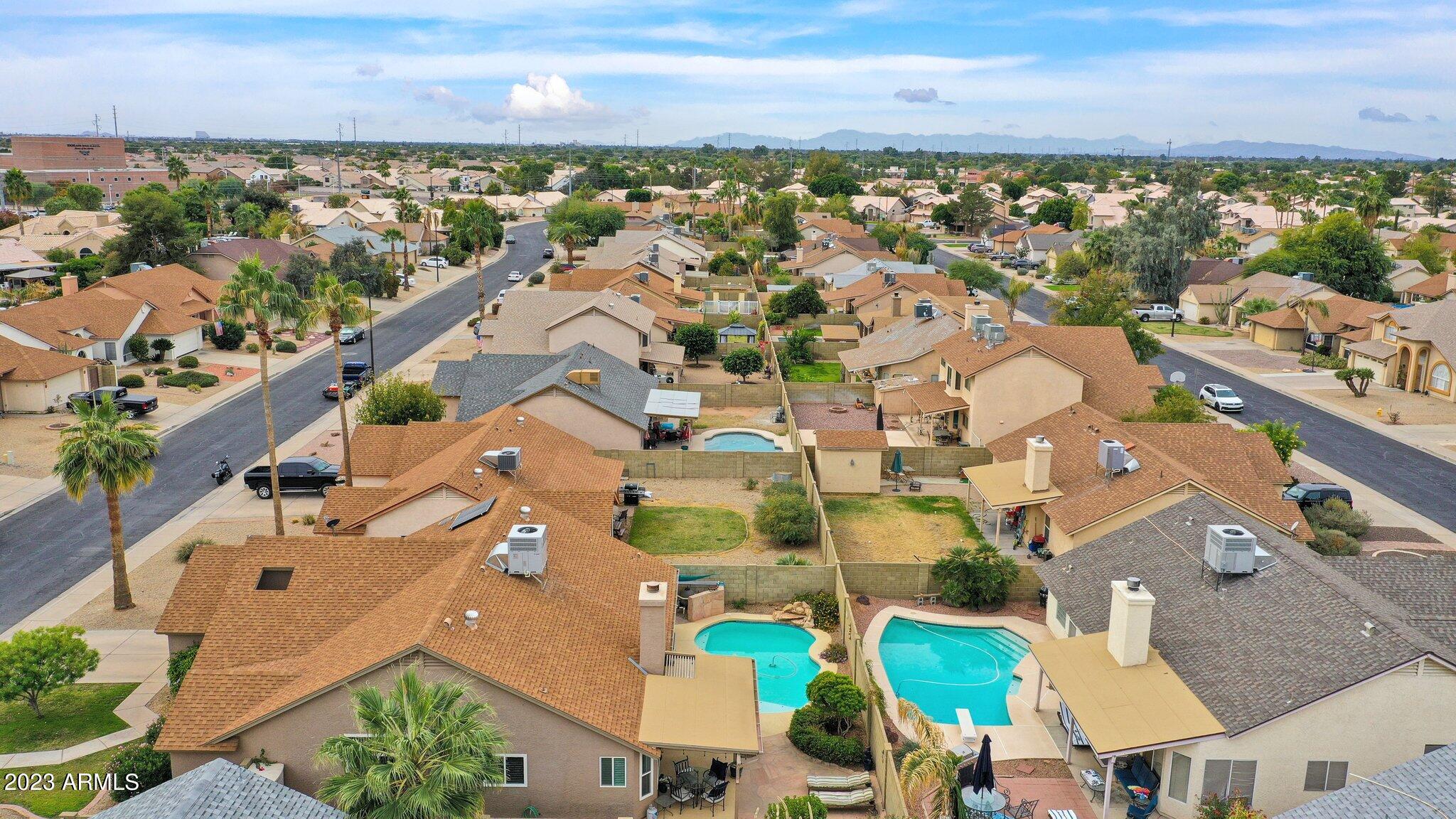4338 East Douglas Avenue Gilbert, AZ 85234 - Photo 44 of 48 an aerial view of residential building with outdoor space