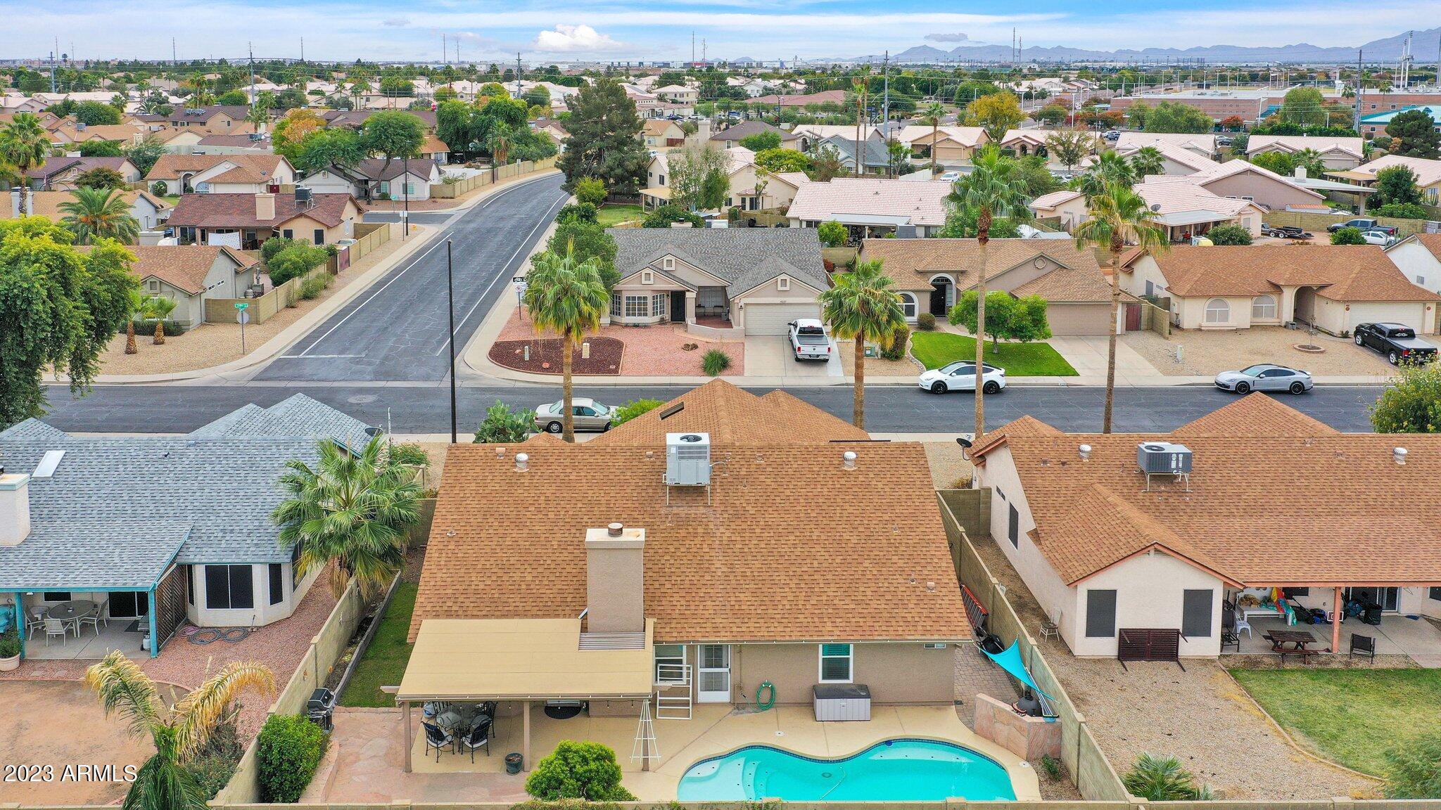 4338 East Douglas Avenue Gilbert, AZ 85234 - Photo 45 of 48 an aerial view of residential houses with outdoor space and parking