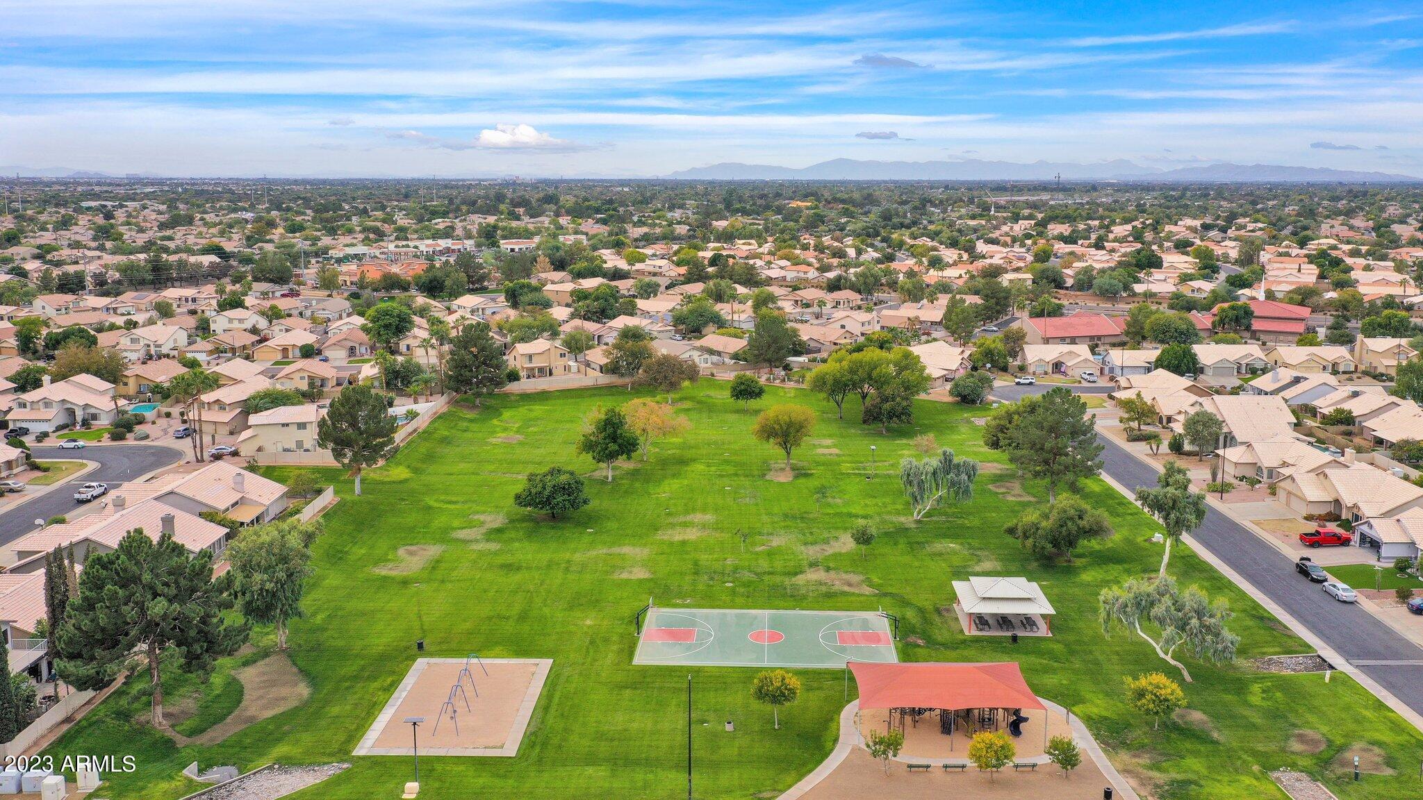 4338 East Douglas Avenue Gilbert, AZ 85234 - Photo 46 of 48 an aerial view of residential houses with outdoor space