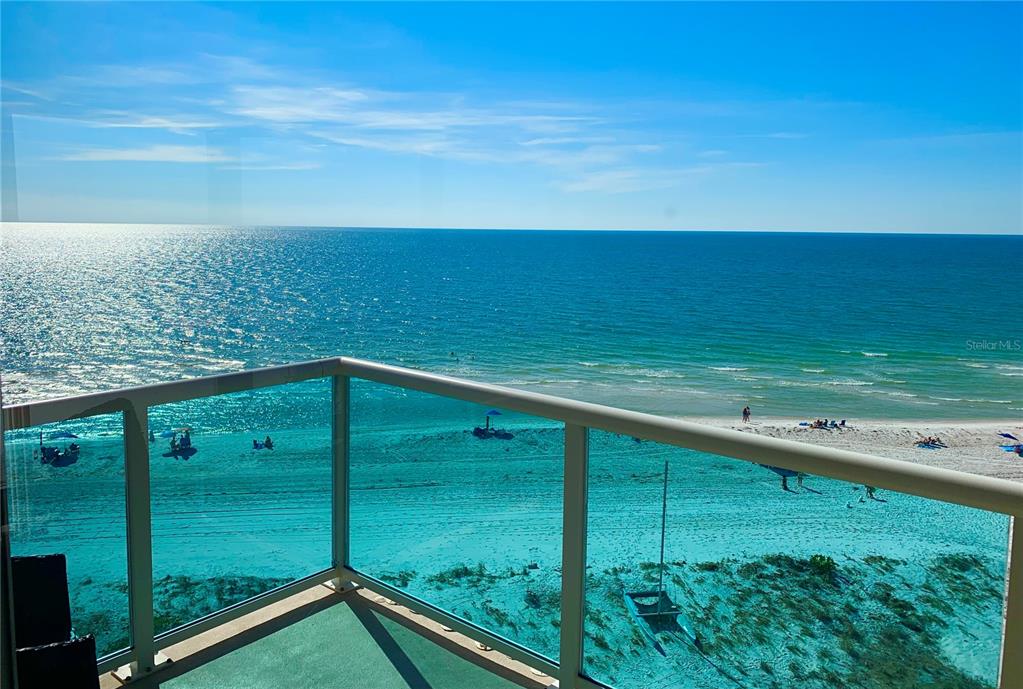 a view of an ocean from a balcony