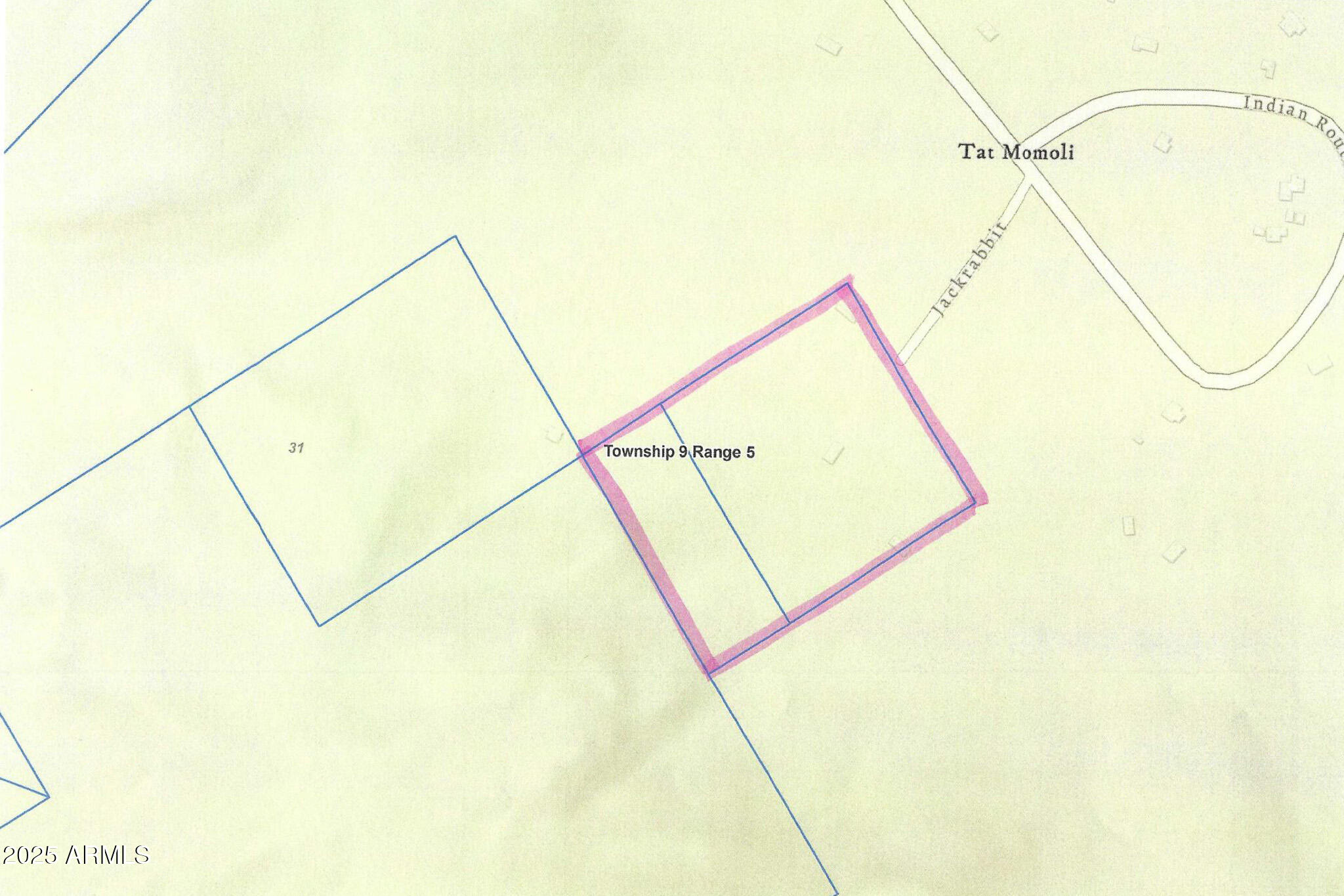 a view of a room with a wall and a window