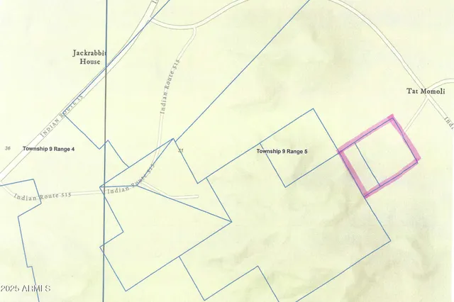 a white house that has a large window