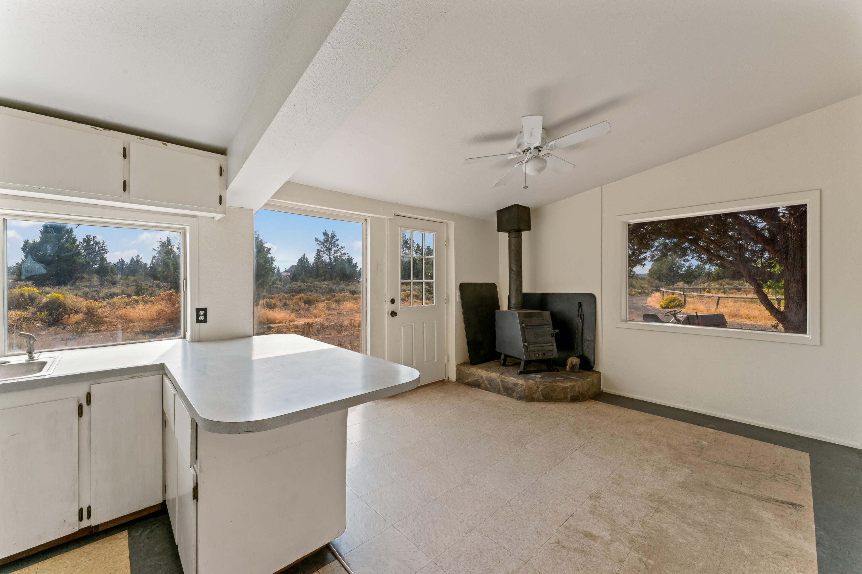 17845 Plainview Road Bend, OR 97703 - Photo 10 of 41 Bonus Area Off Shop w/ Kitchenette, Full Bath, and Wood-Burning Stove