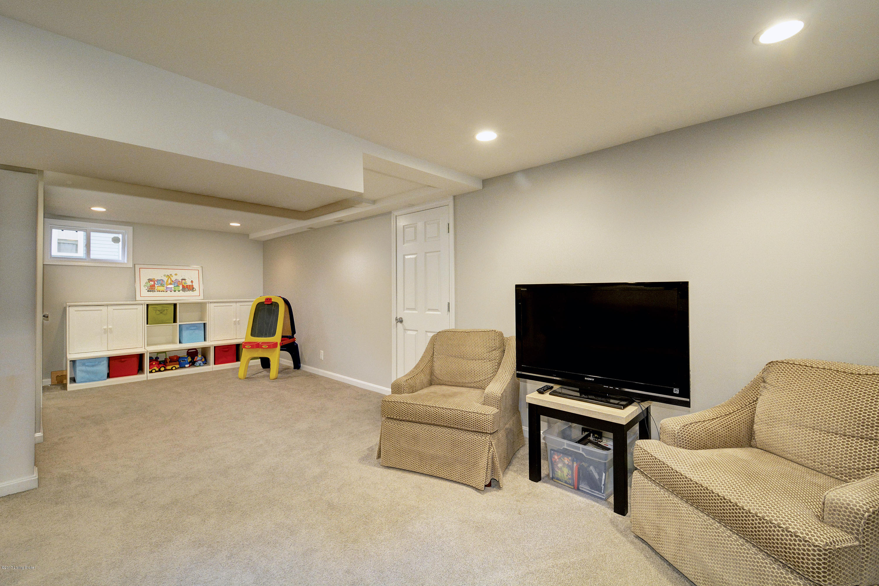 217 Iola Road Louisville, KY 40207 - Photo 29 of 44 The cozy lower level is designed to offer a second family room space.