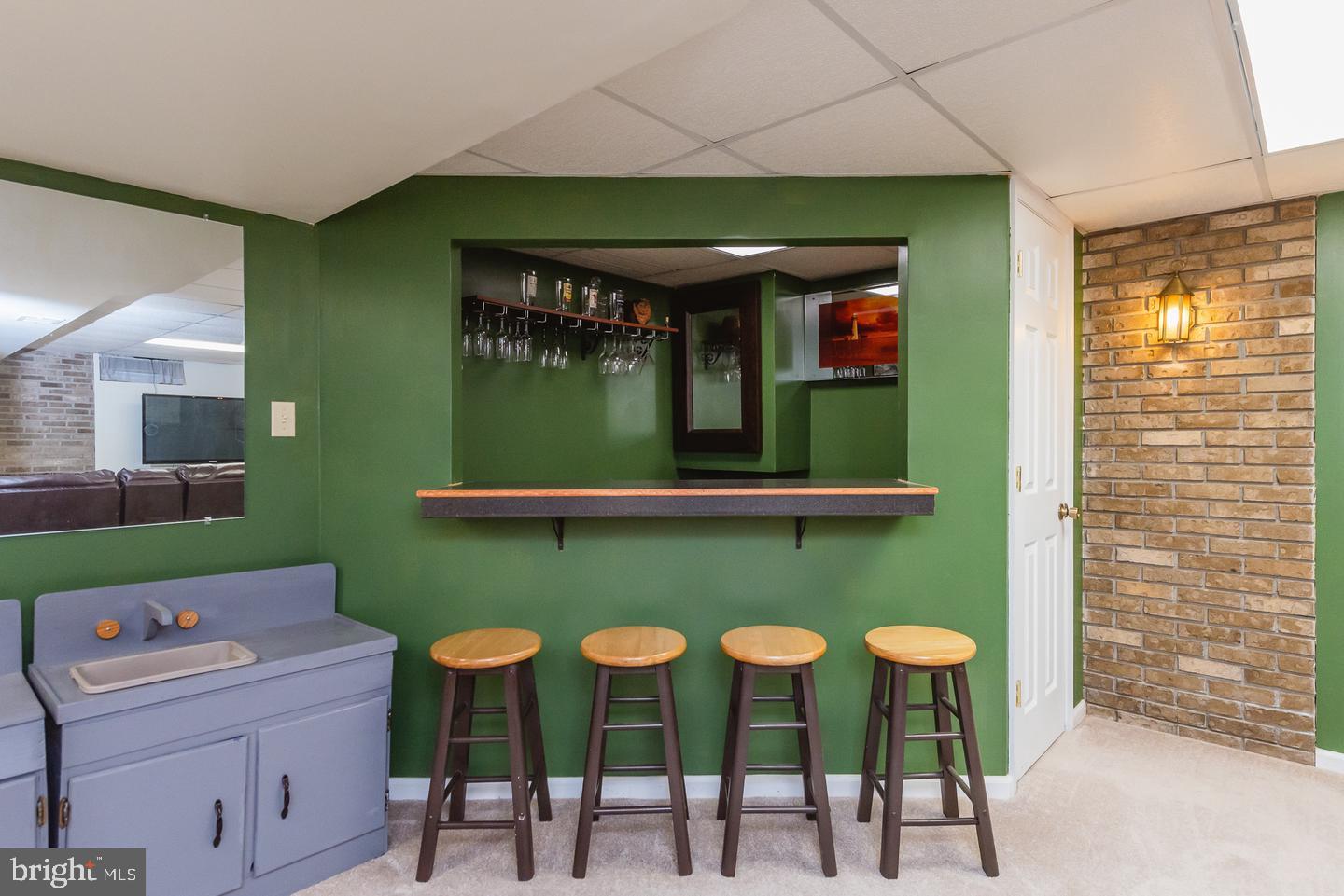 4217 Mispillion Road Nottingham, MD 21236 - Photo 7 of 40 Rec room bar