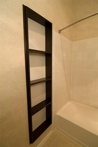 a bathroom with a bathtub