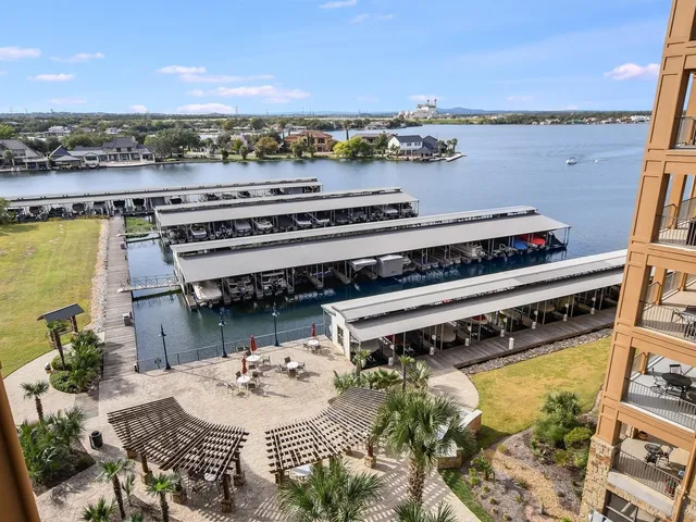 a view of a balcony with chair and table