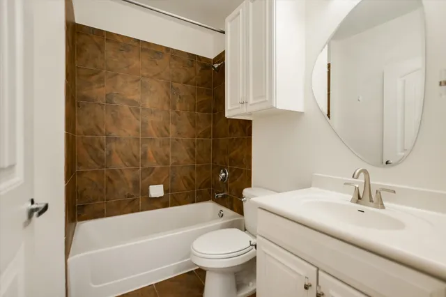 a bathroom with a sink a toilet and a bathtub