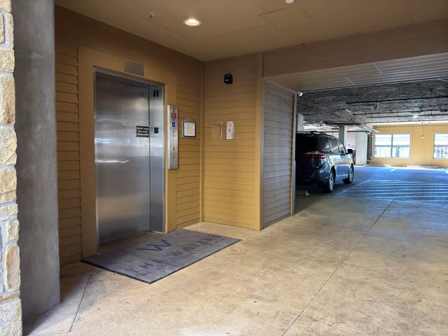 a view of a swimming pool with a lounge chairs