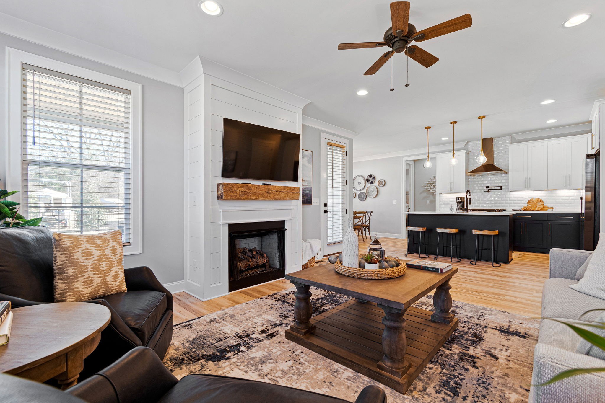 622 RIVER WATCH Way Winchester, TN 37398 - Photo 8 of 22 a living room with furniture a fireplace and a flat screen tv