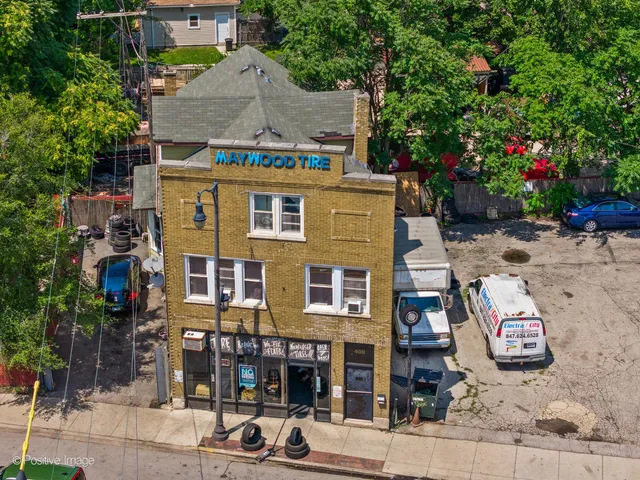 a front view of a building with street view