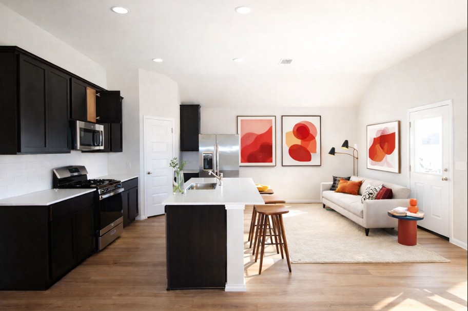 11905 Dillon Fls Drive Austin, TX 78747 - Photo 9 of 9 a living room with furniture kitchen view and a flat screen tv