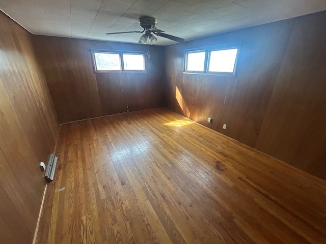 529 North 2nd Street Watseka, IL 60970 - Photo 9 of 11 wooden floor in an empty room with a window