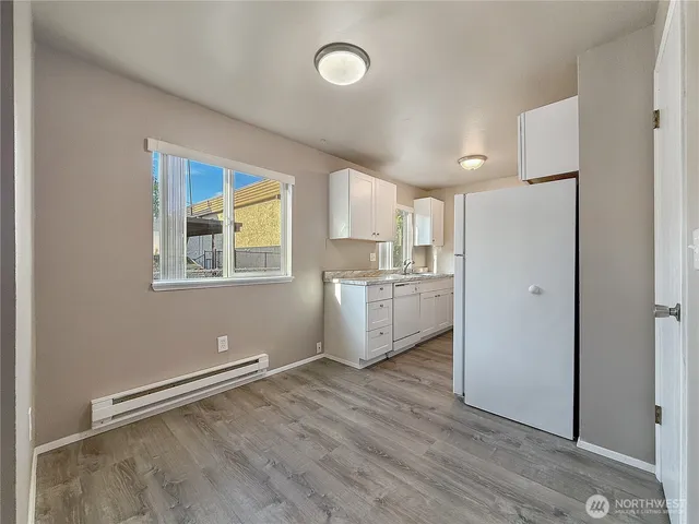 a bathroom with a sink a toilet and a bathtub