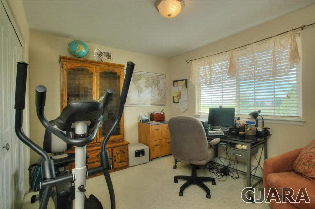 1598 P Road Loma, CO 81524 - Photo 16 of 25 a view of a workspace with furniture and a window