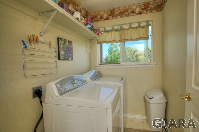 1598 P Road Loma, CO 81524 - Photo 17 of 25 a utility room with dryer and washer
