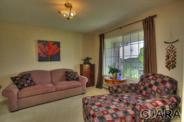 1598 P Road Loma, CO 81524 - Photo 5 of 25 a living room with furniture and a large window