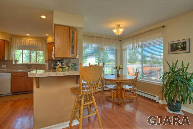 1598 P Road Loma, CO 81524 - Photo 8 of 25 a view of a kitchen with dining table and chairs