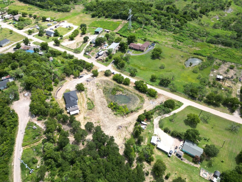 441 Mesa Road Waxahachie, TX 75167 - Photo 8 of 11 Aerial overview of property's location featuring rural landscape and a large body of water