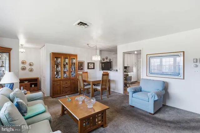 a living room with furniture and a couch