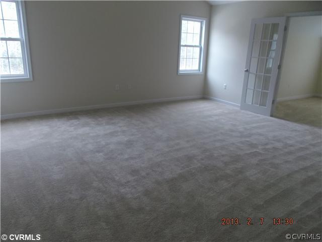 10320 Cattail Road Chesterfield, VA 23838 - Photo 12 of 24 an empty room that has a window