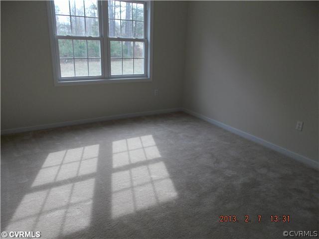 10320 Cattail Road Chesterfield, VA 23838 - Photo 19 of 24 an empty room with windows