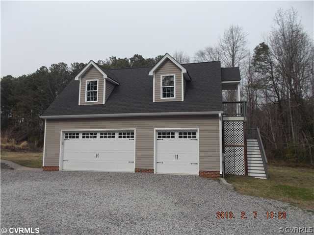 10320 Cattail Road Chesterfield, VA 23838 - Photo 2 of 24 a view of a house with a yard