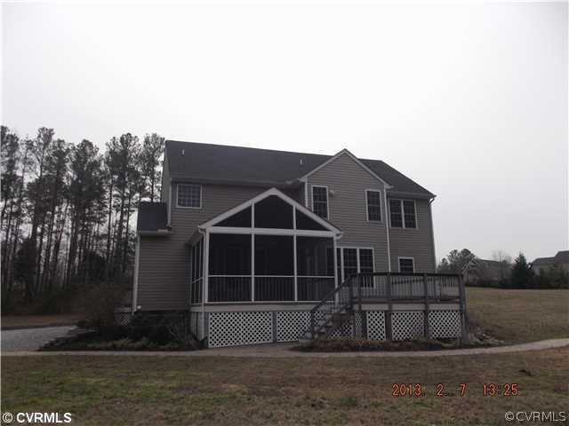 10320 Cattail Road Chesterfield, VA 23838 - Photo 3 of 24 a front view of a house with a yard