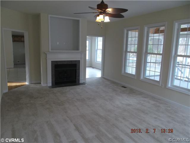 10320 Cattail Road Chesterfield, VA 23838 - Photo 7 of 24 a view of a livingroom with a fireplace