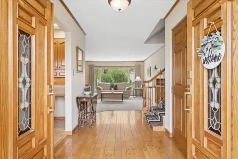 a living room with furniture and a table