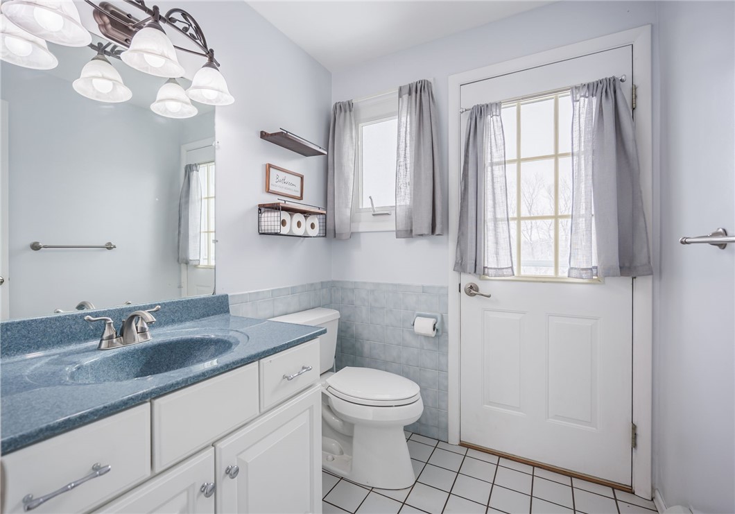 81 Curtis Road Parma, NY 14468 - Photo 35 of 50 GUEST BATH WITH ACCESS TO THE DECK & BACKYARD