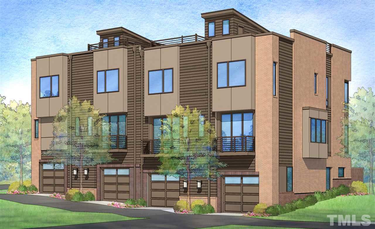 602 South West Street Raleigh, NC 27601 - Photo 3 of 10 a front view of a residential apartment building with a yard