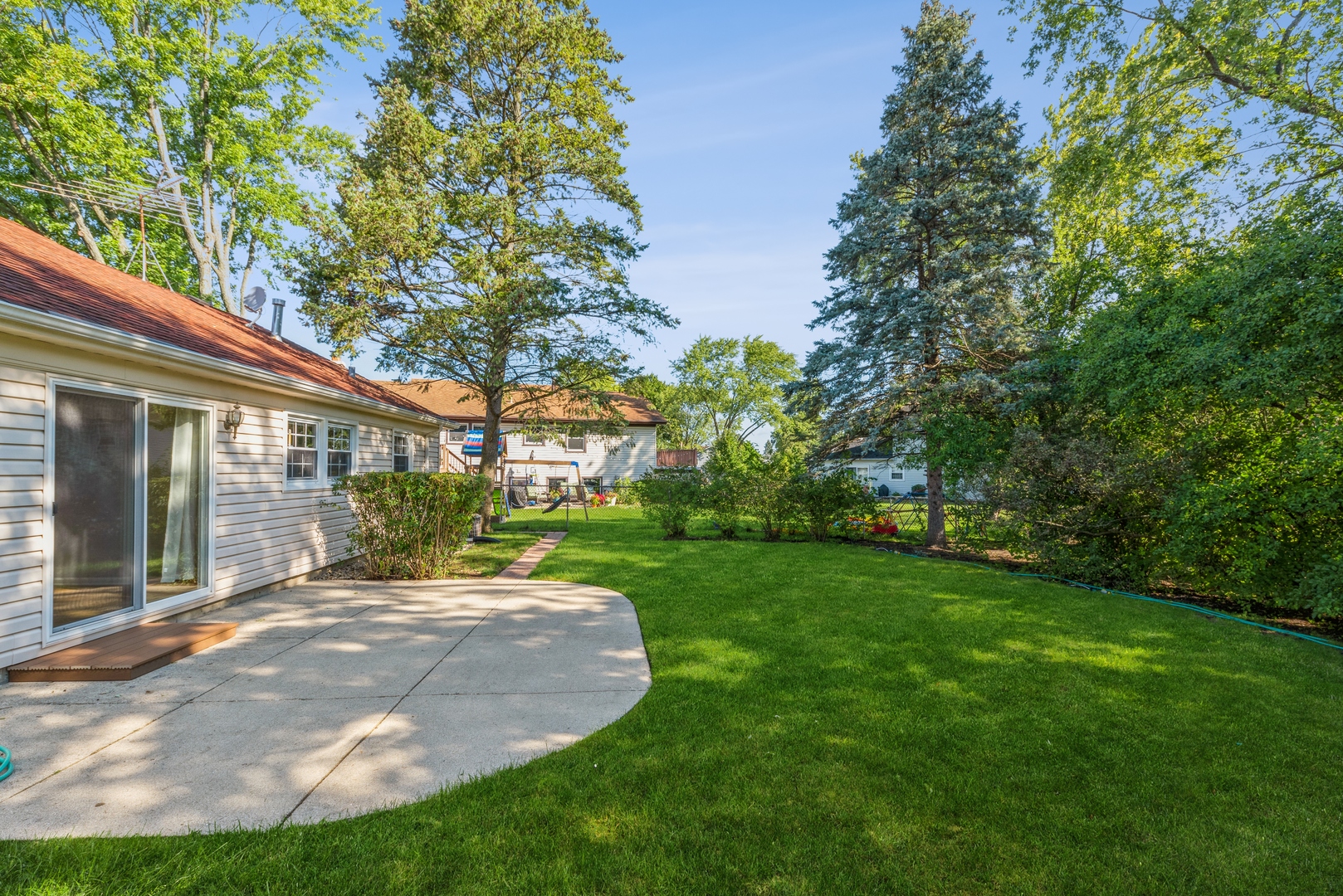 311 Weidner Road Buffalo Grove, IL 60089 - Photo 15 of 16 a view of a house with a yard