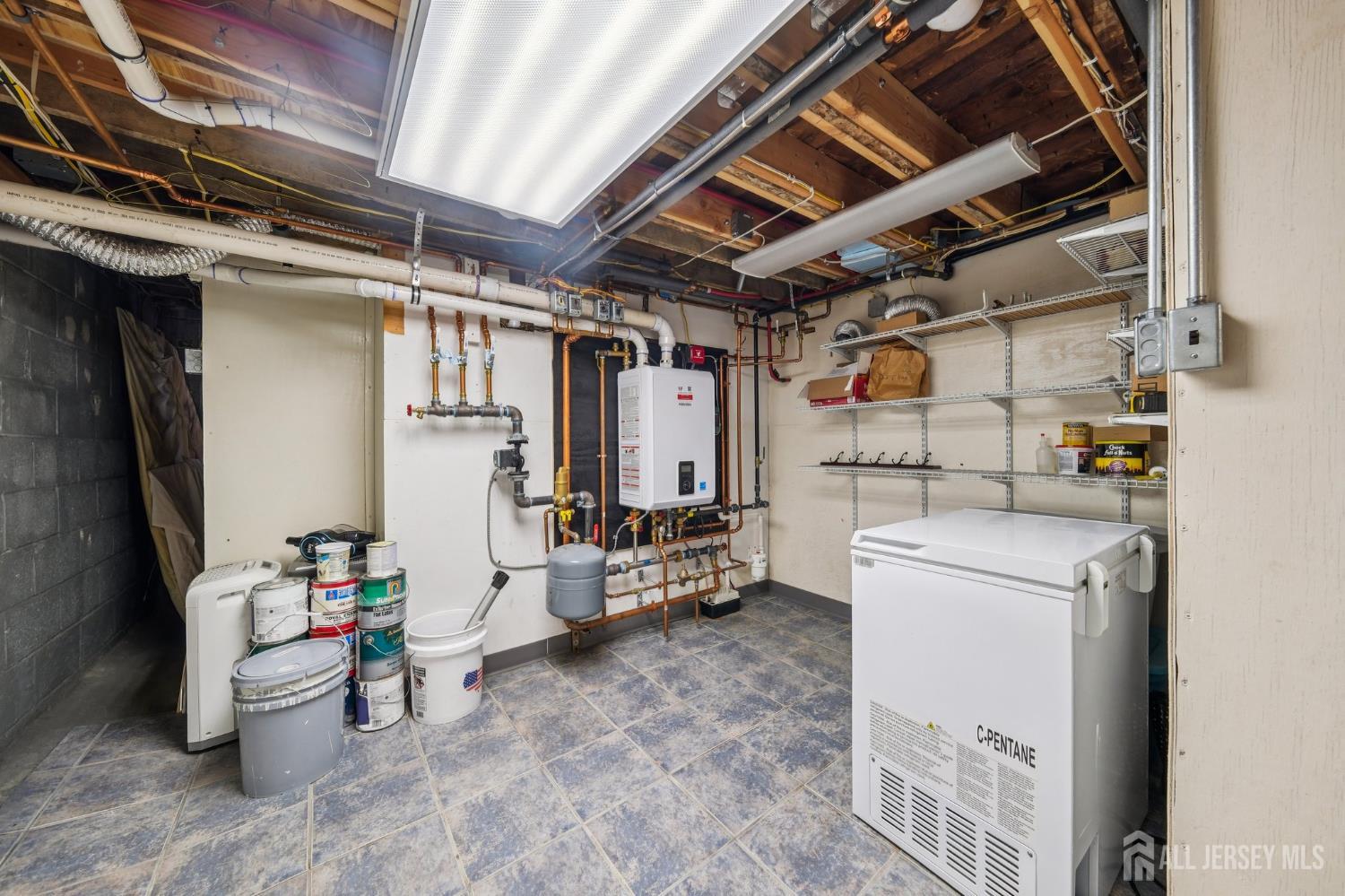 187 Hoover Avenue Edison, NJ 08837 - Photo 18 of 29 a utility room with dryer and washer
