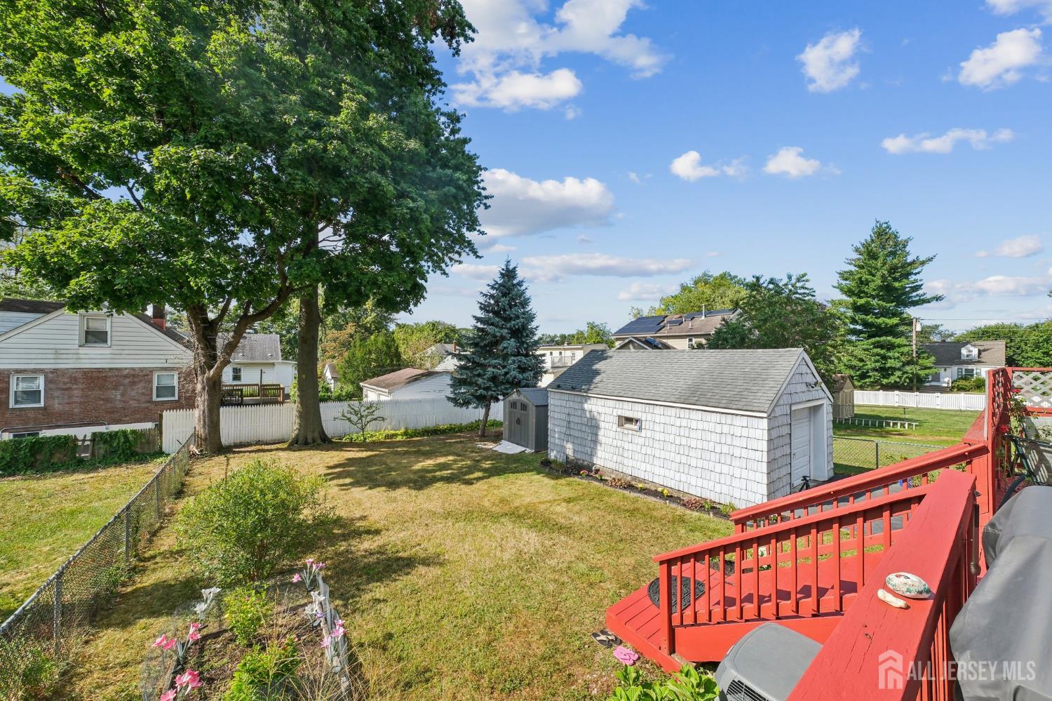 187 Hoover Avenue Edison, NJ 08837 - Photo 23 of 29 a view of a street with a building in the background