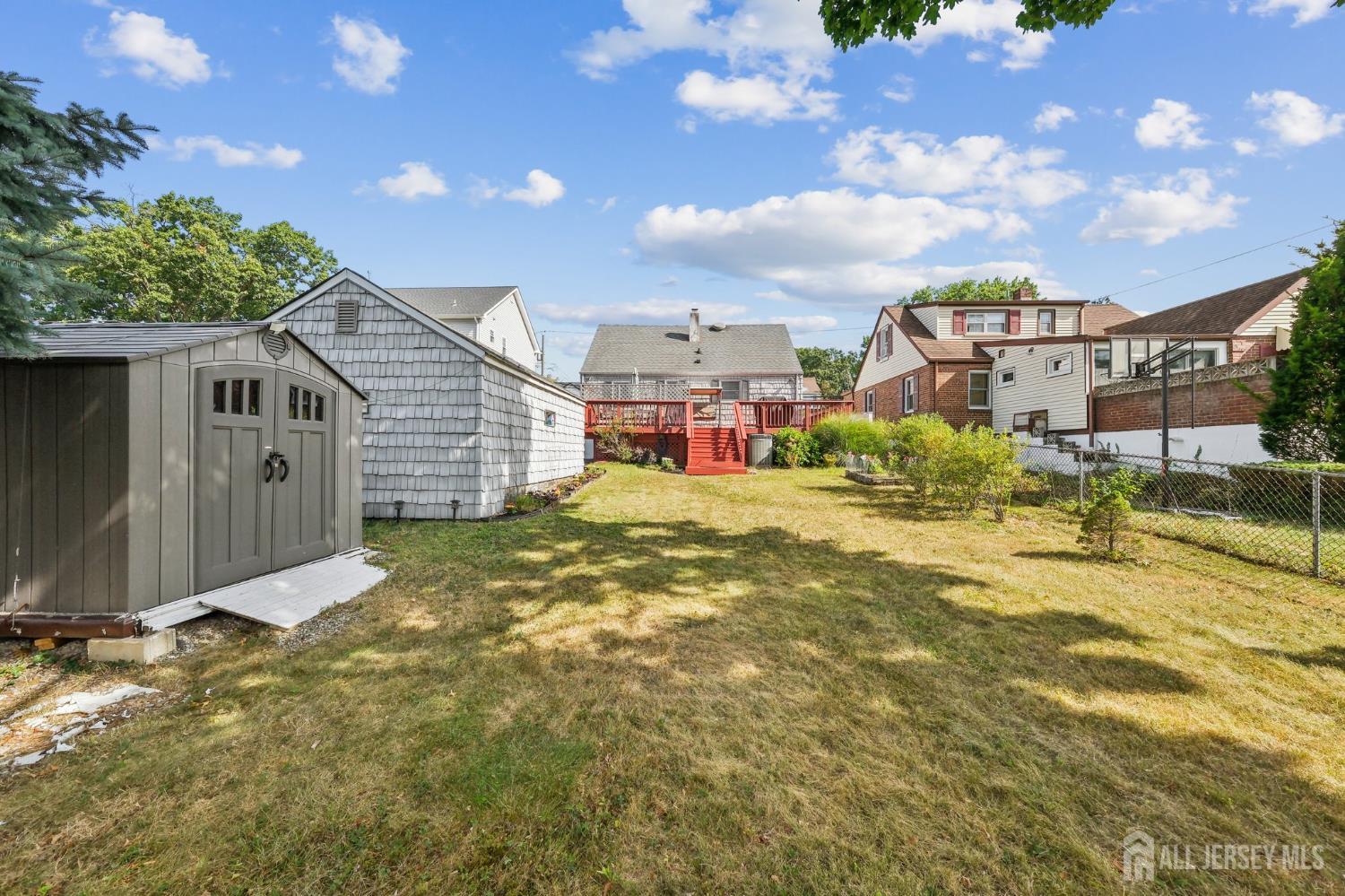 187 Hoover Avenue Edison, NJ 08837 - Photo 25 of 29 a view of a house with a yard