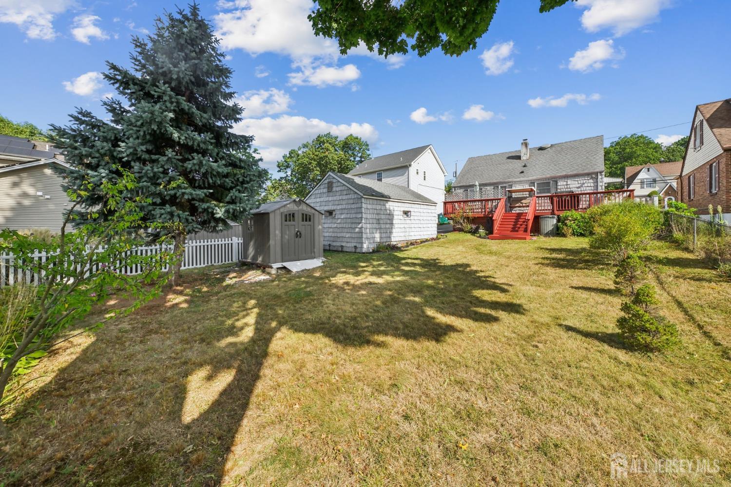 187 Hoover Avenue Edison, NJ 08837 - Photo 26 of 29 a view of a house with a yard