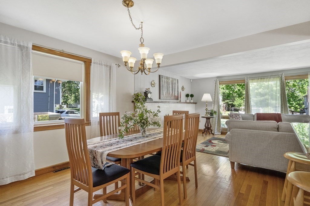 122 Chickering Road Dedham, MA 02026 - Photo 17 of 41 a view of a dining room with furniture window and wooden floor