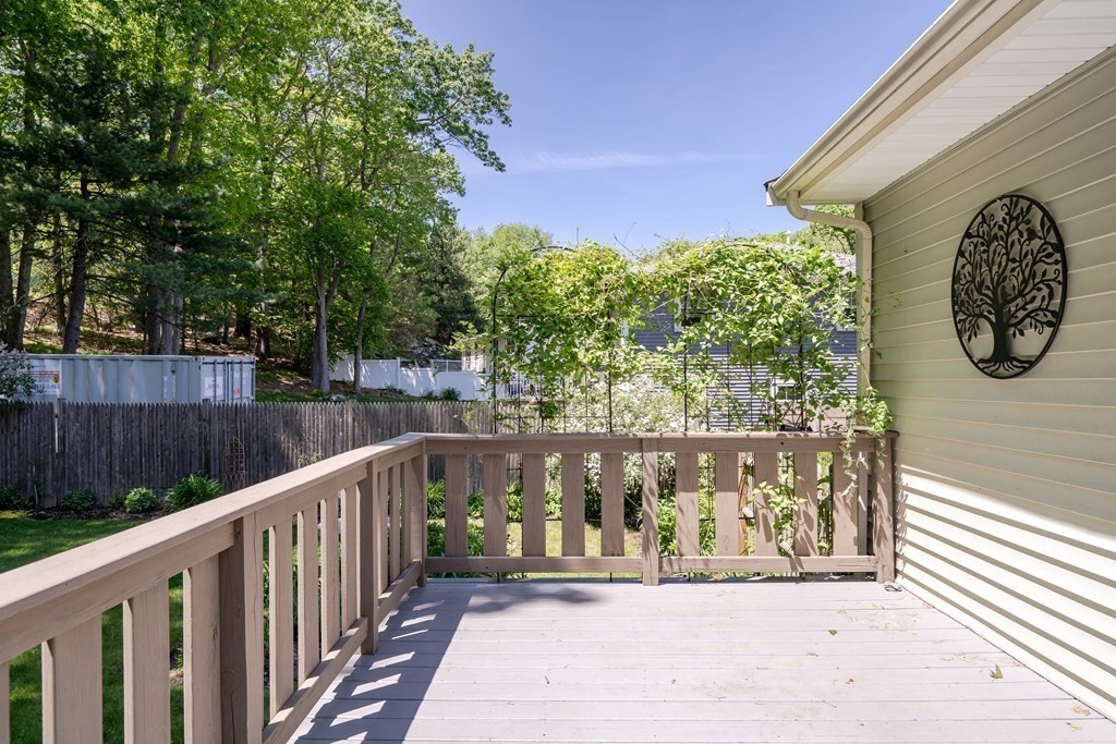122 Chickering Road Dedham, MA 02026 - Photo 18 of 41 a view of a small yard next to a yard