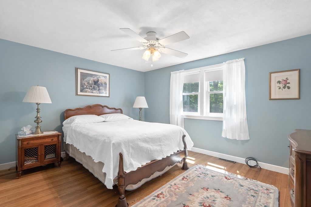 122 Chickering Road Dedham, MA 02026 - Photo 20 of 41 a bedroom with a bed and a window