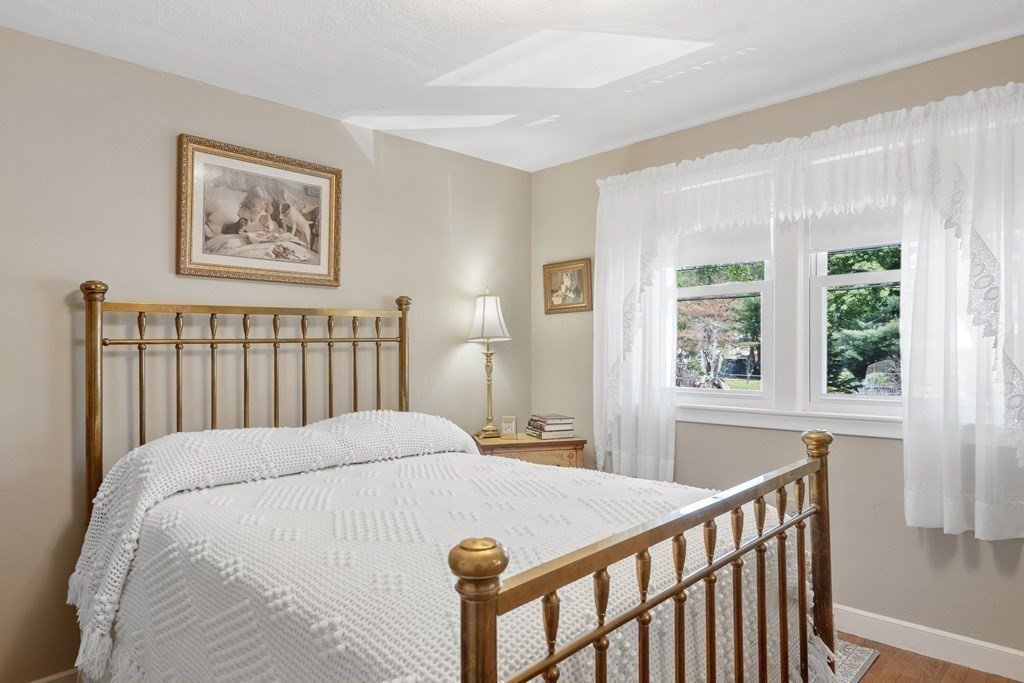122 Chickering Road Dedham, MA 02026 - Photo 27 of 41 a bedroom with a bed and a window