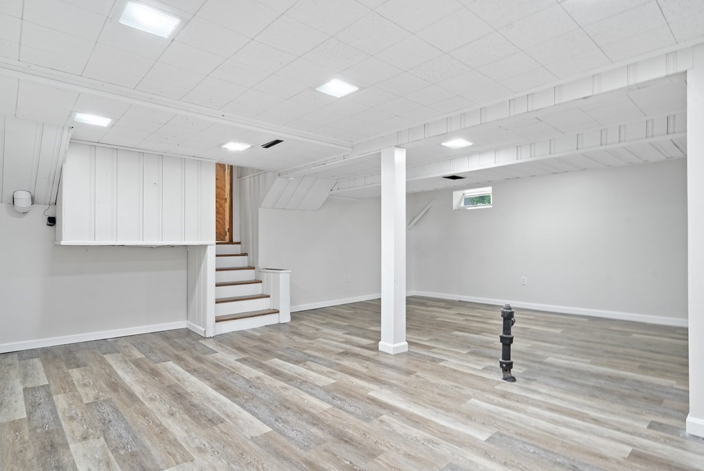 122 Chickering Road Dedham, MA 02026 - Photo 32 of 41 a view of empty room with wooden floor