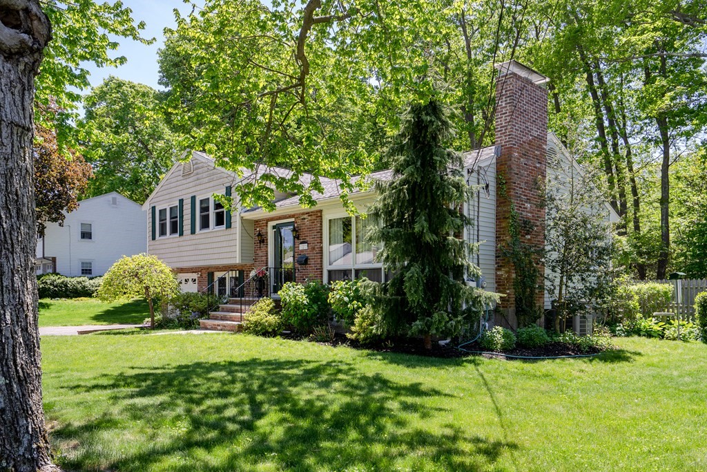 122 Chickering Road Dedham, MA 02026 - Photo 41 of 41 a front view of a house with garden