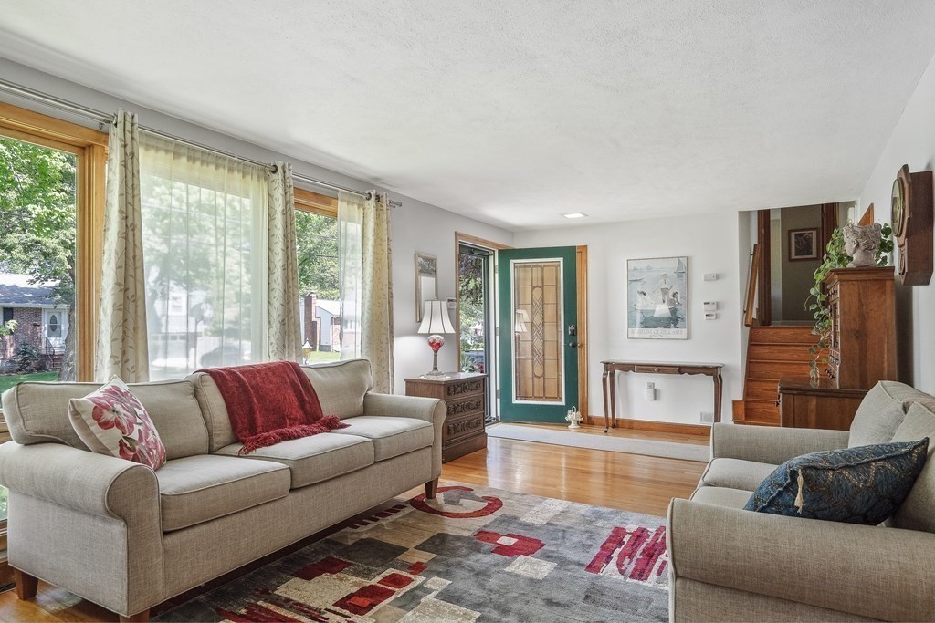 122 Chickering Road Dedham, MA 02026 - Photo 5 of 41 a living room with furniture and a large window