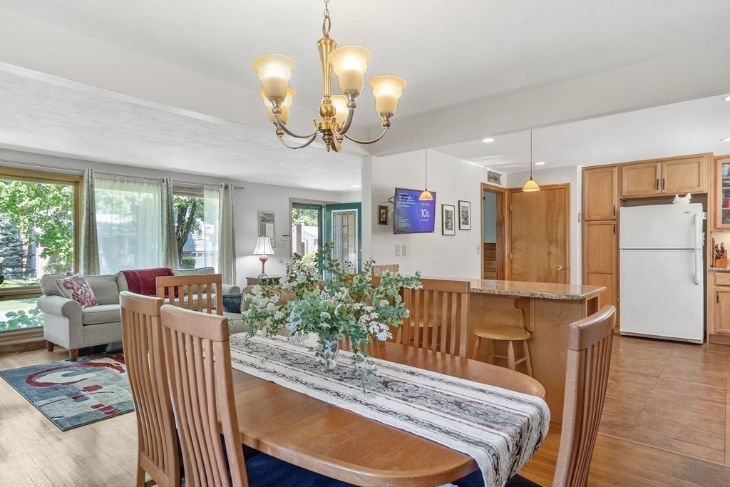122 Chickering Road Dedham, MA 02026 - Photo 10 of 41 a view of a dining room with furniture window and wooden floor