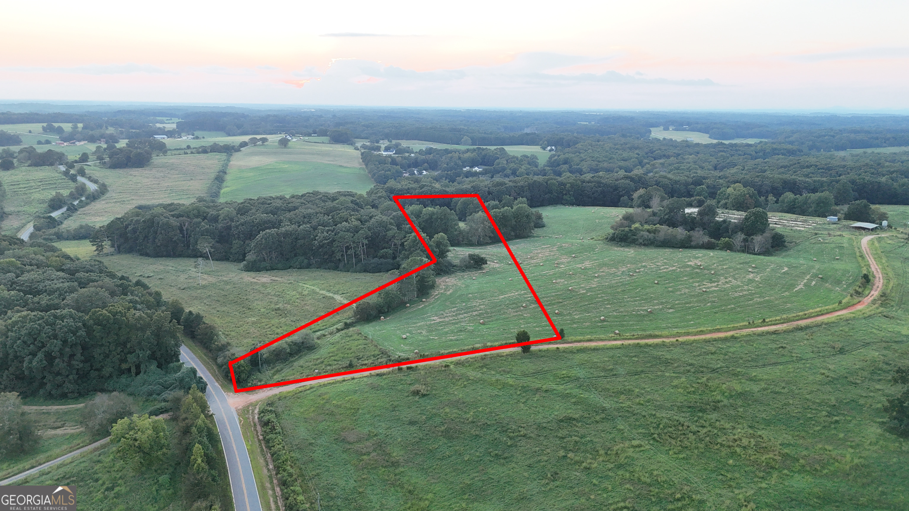 9 West L Williams Road Commerce, GA 30530 - Photo 2 of 34 an aerial view of a houses with swimming pool