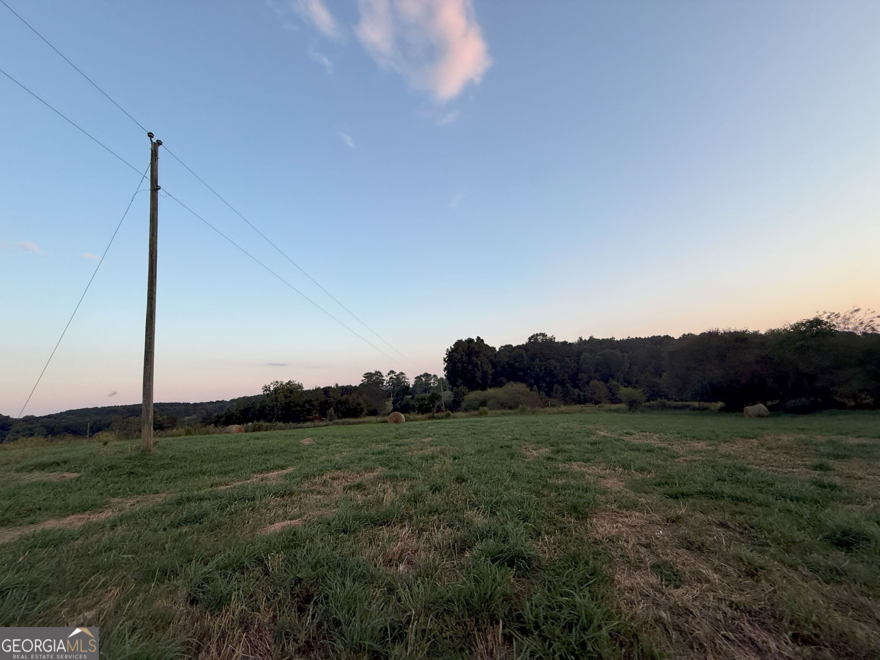 9 West L Williams Road Commerce, GA 30530 - Photo 4 of 34 a view of a grassy field