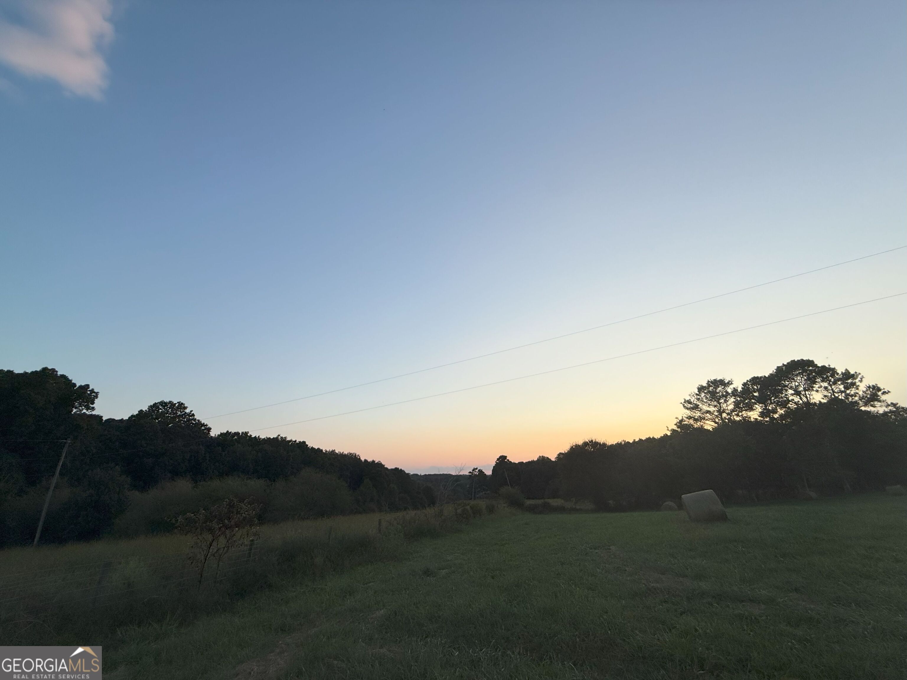9 West L Williams Road Commerce, GA 30530 - Photo 5 of 34 a view of a mountain range with trees in the background