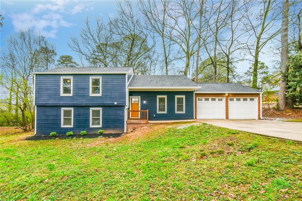 2924 Cocklebur Road Decatur, GA 30034 - Photo 1 of 1 front view of a house with a yard